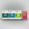 Set of Yard Bros fertilizer products on a gray background